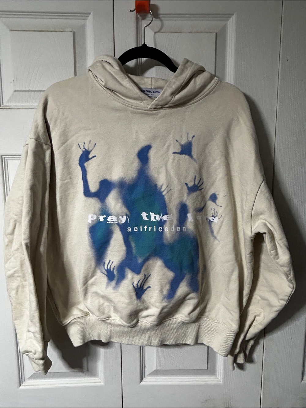 aelfric eden Cream Hoodie with Blue Graphic Pray the Lo
